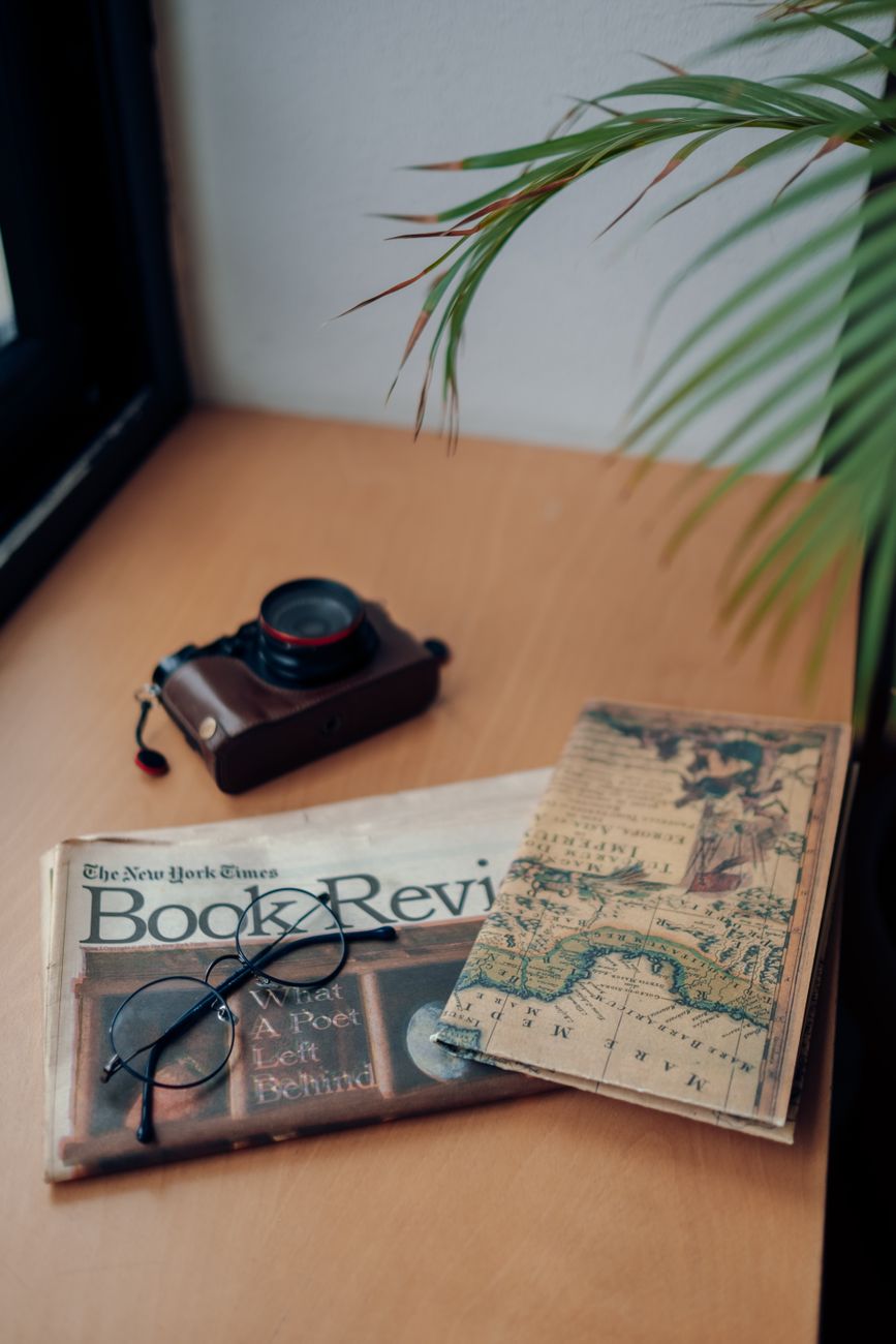 Travel writer reviewing regional field map