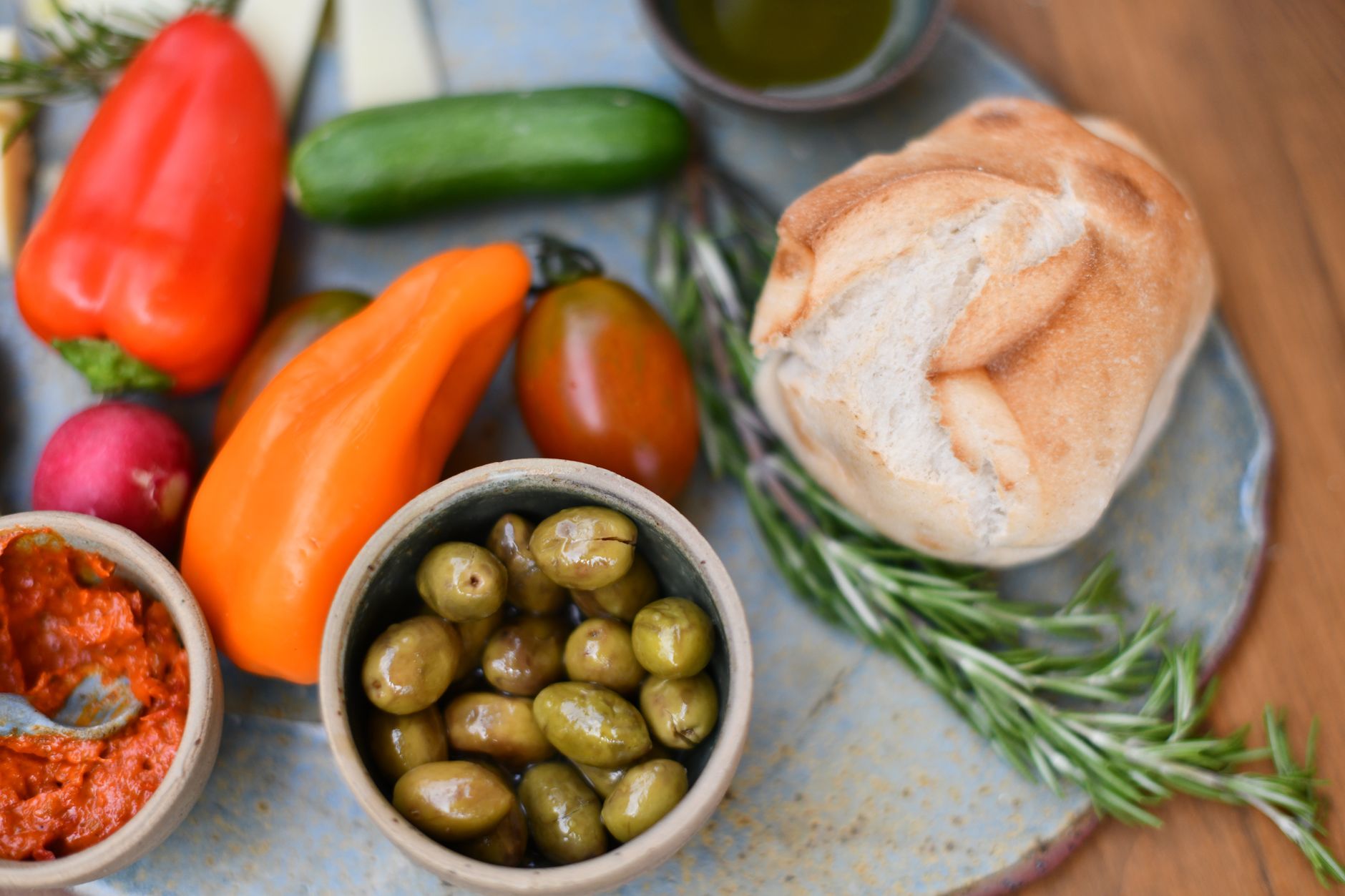 Wild herbs and rustic Italian culinary table